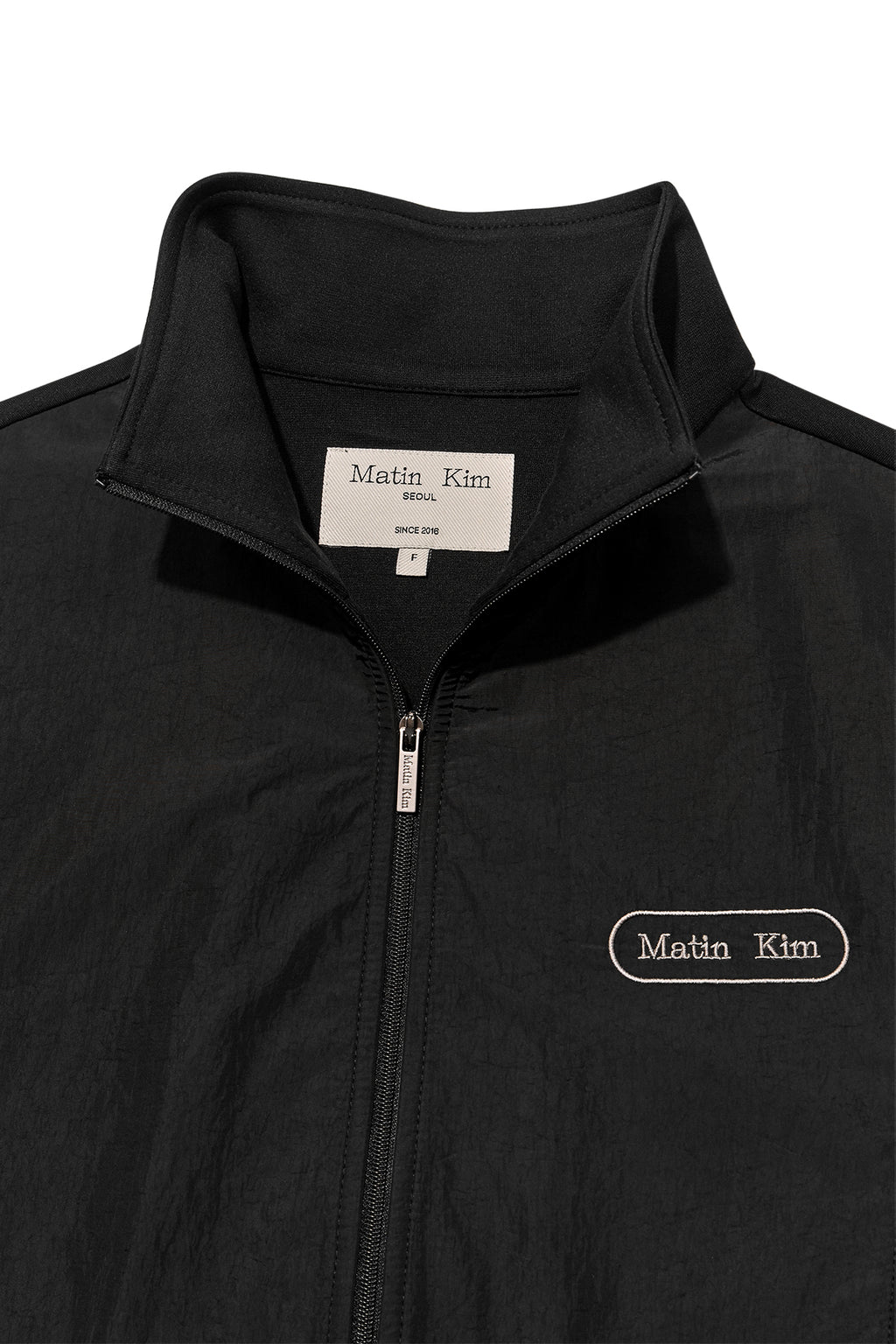 [matinkim] HIGH NECK WINDBREAKER ZIP UP FOR WOMEN IN BLACK