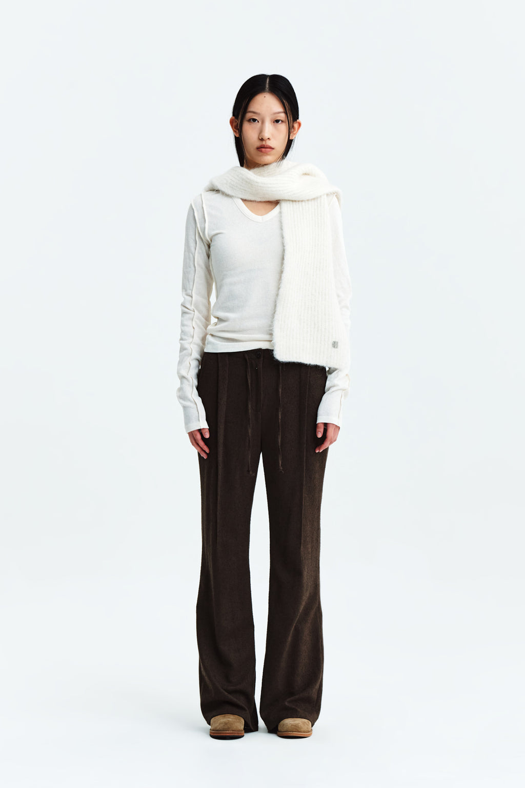 [matinkim] WAIST BUTTON POINT STRING SLIM PANTS IN BROWN