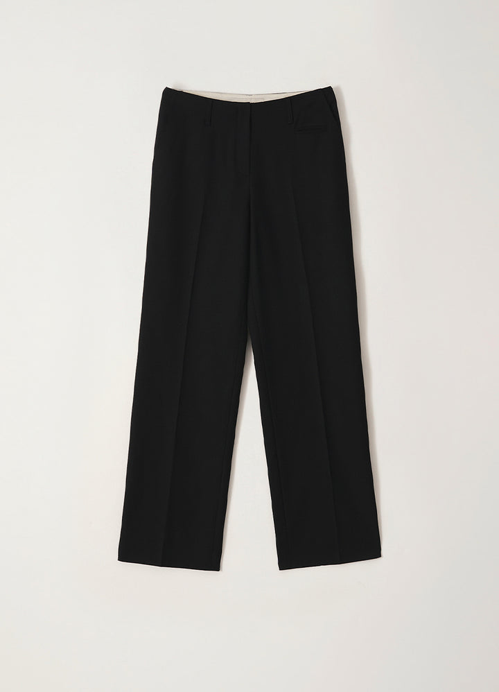 Nothing Written Low-rise tailored wool trousers (Black)