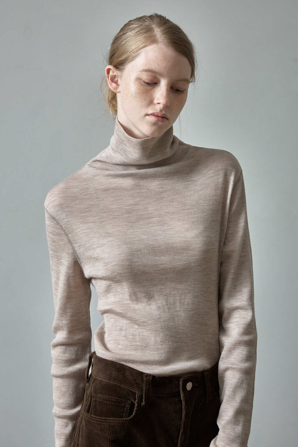 Facade Pattern Breeze Wool Roll Neck Top