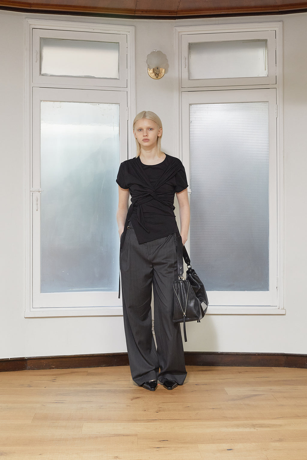 [matinkim] TUCK POINT STRIPE TROUSER IN CHARCOAL