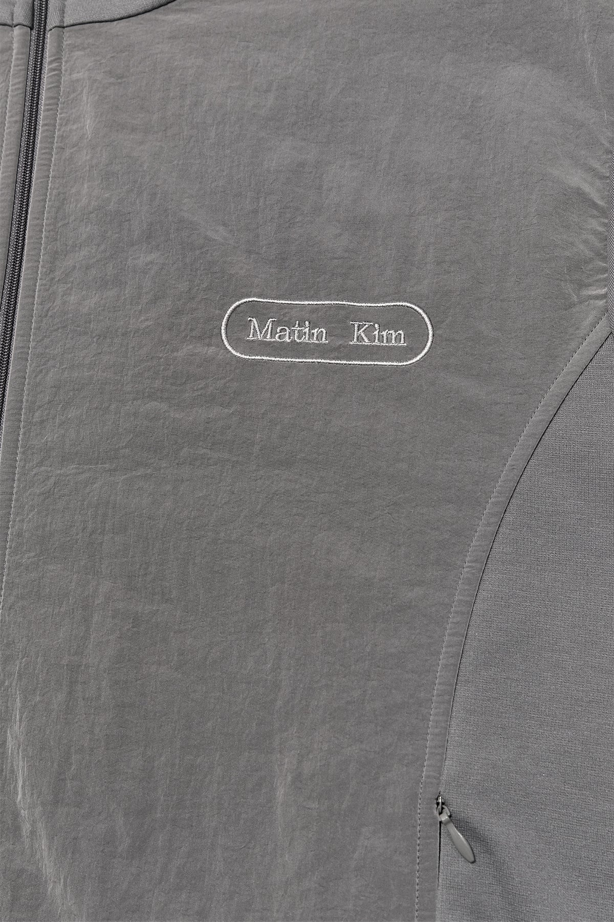 [matinkim] HIGH NECK WINDBREAKER ZIP UP FOR MEN IN GREY