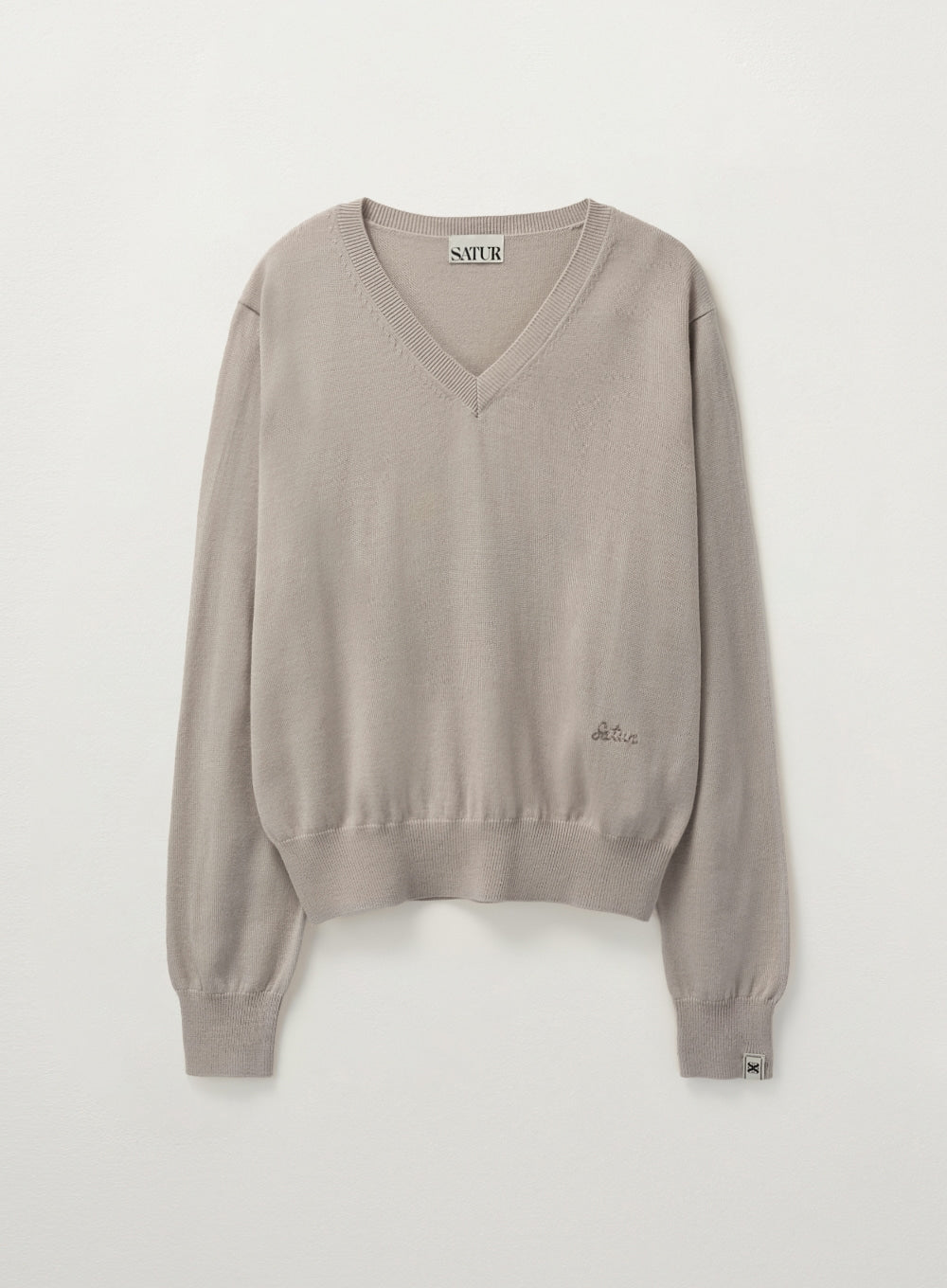Clothing in beige - Premium quality product image