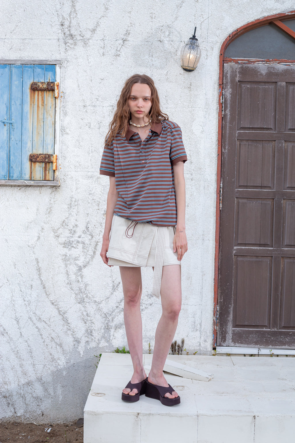 [matinkim] STITCH POINT BELTED WRAP SKIRT IN LIGHT BEIGE