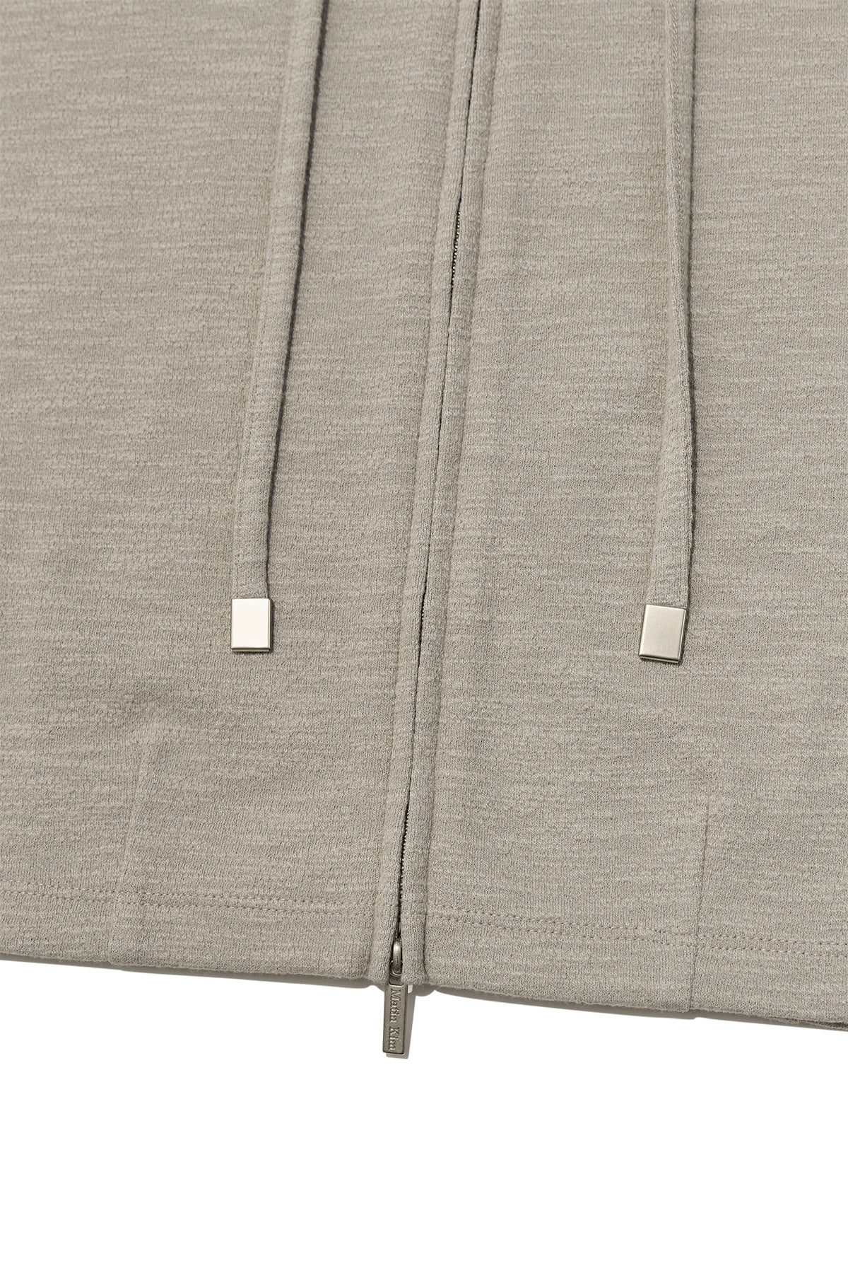 [matinkim] SLEEVE SLIT POINT HOODY ZIP UP IN BEIGE