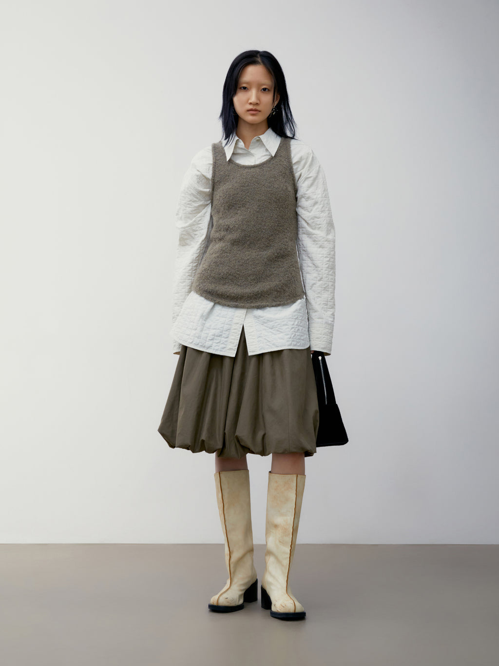 [low_classic] BUBBLE MIDI SKIRT
KHAKI