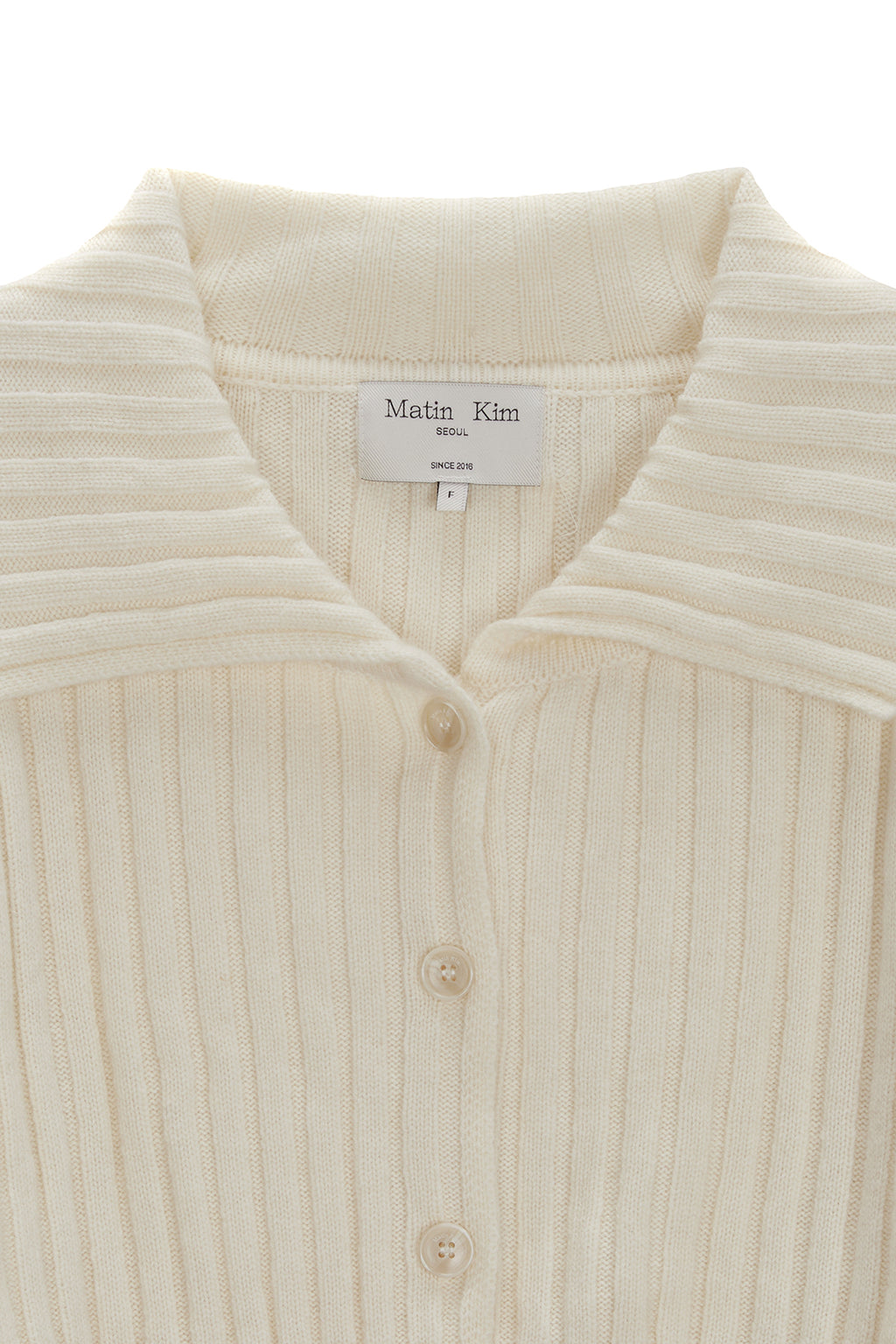 [matinkim] SEMI CROP KNIT BUTTON CARDIGAN IN IVORY