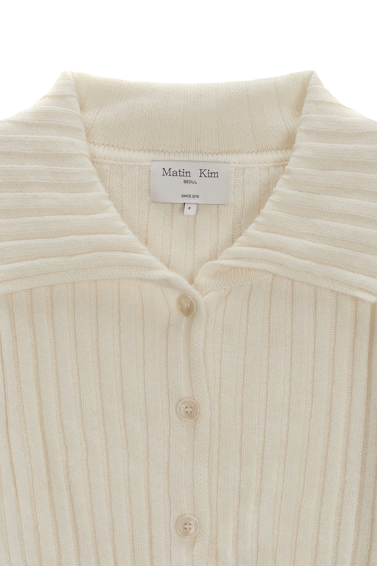 [matinkim] SEMI CROP KNIT BUTTON CARDIGAN IN IVORY