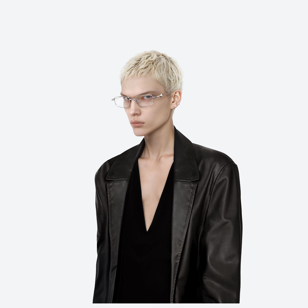 Gentle Monster Saga 02 silver sunglasses, showcasing authentic Korean designer fashion.
