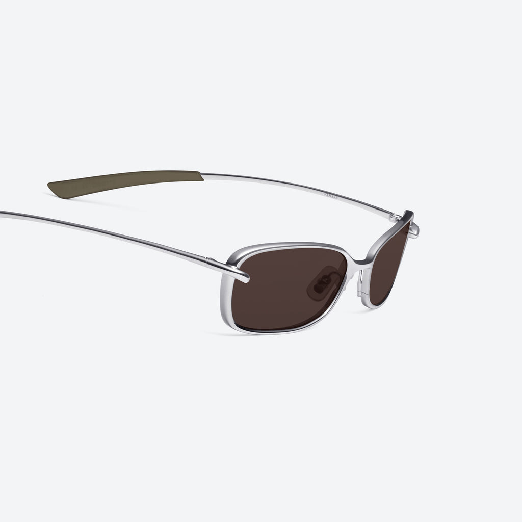 Gentle Monster Rollie 02(BR) Sunglasses in silver, showcasing authentic Korean designer fashion.