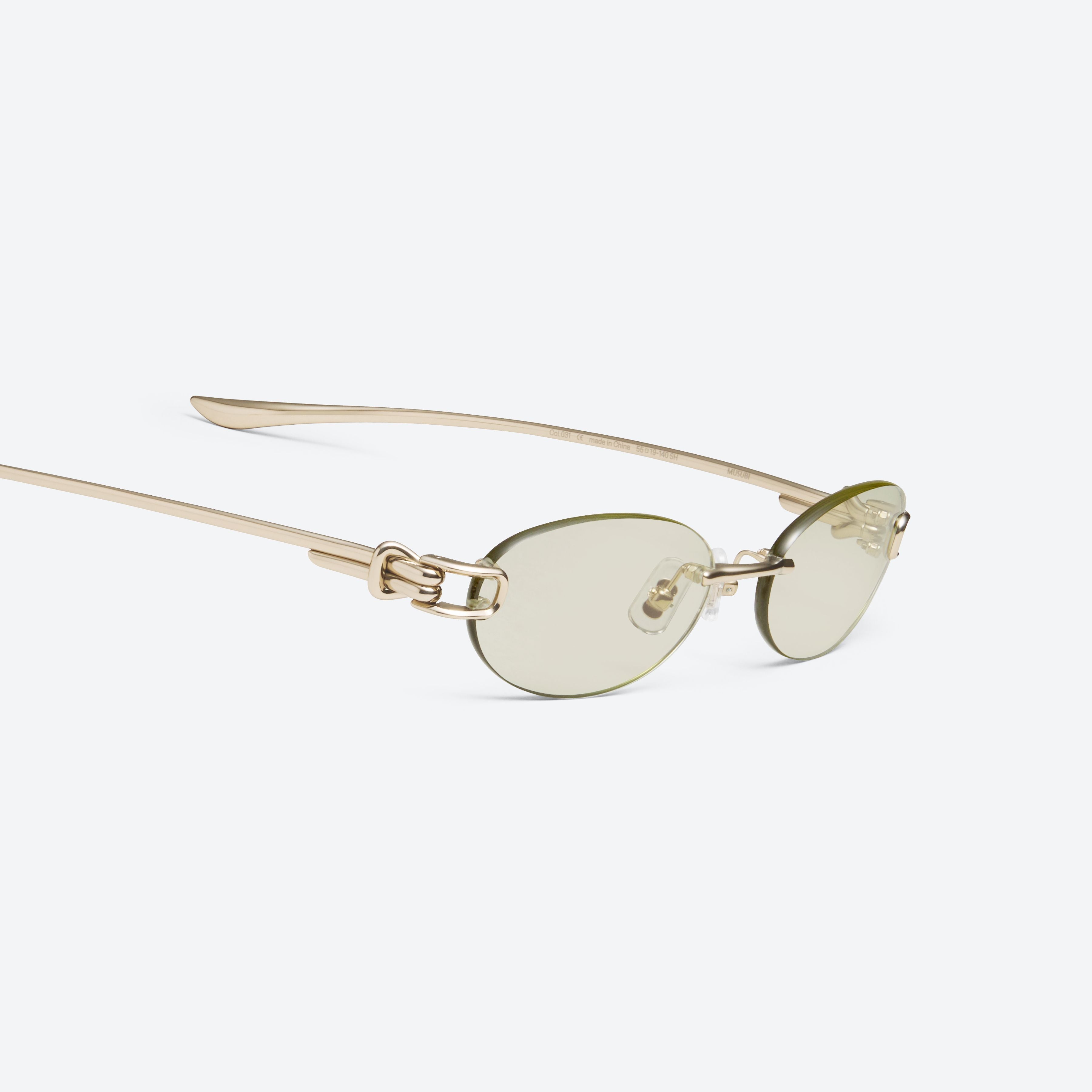 Gentle Monster Musubi 031 Sunglasses in gold, showcasing authentic Korean designer fashion.