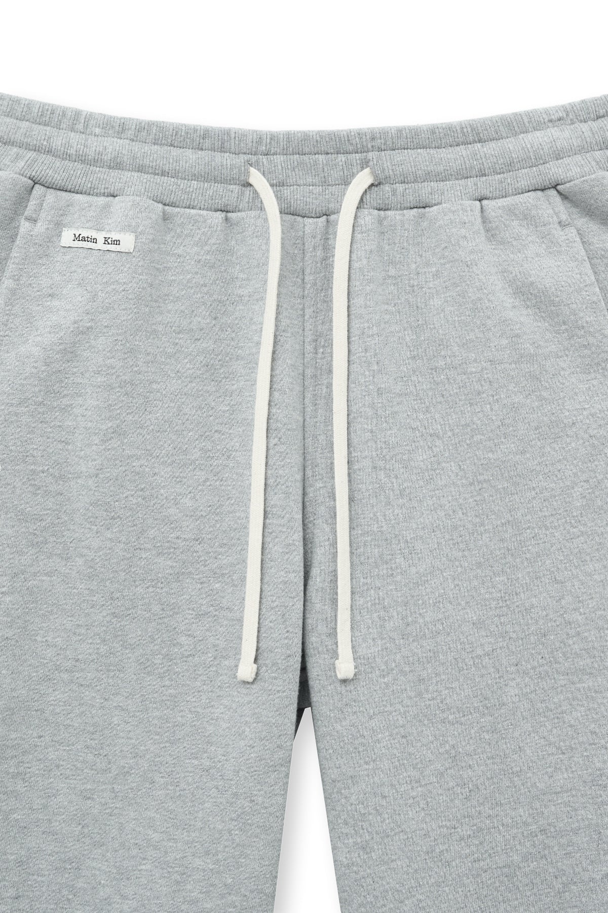 [matinkim] BOOTS CUT SLIM CARGO SWEATPANTS IN GREY