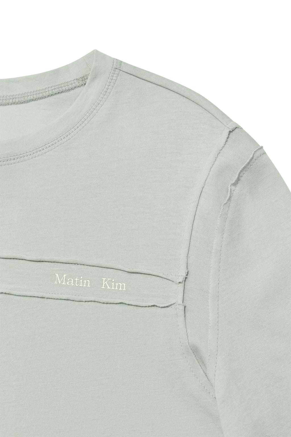 [matinkim] CUT LINE DETAIL LONG SLEEVE LOGO TOP IN MINT