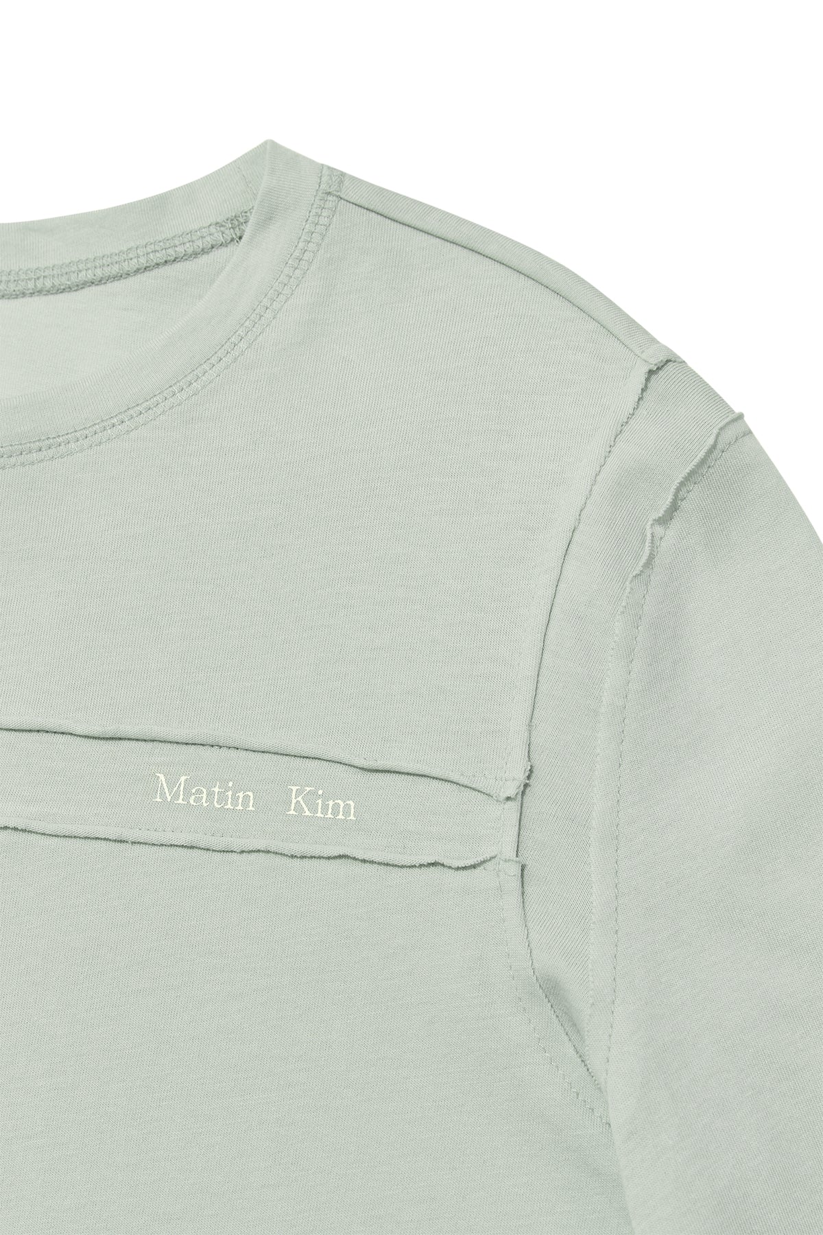 [matinkim] CUT LINE DETAIL LONG SLEEVE LOGO TOP IN MINT