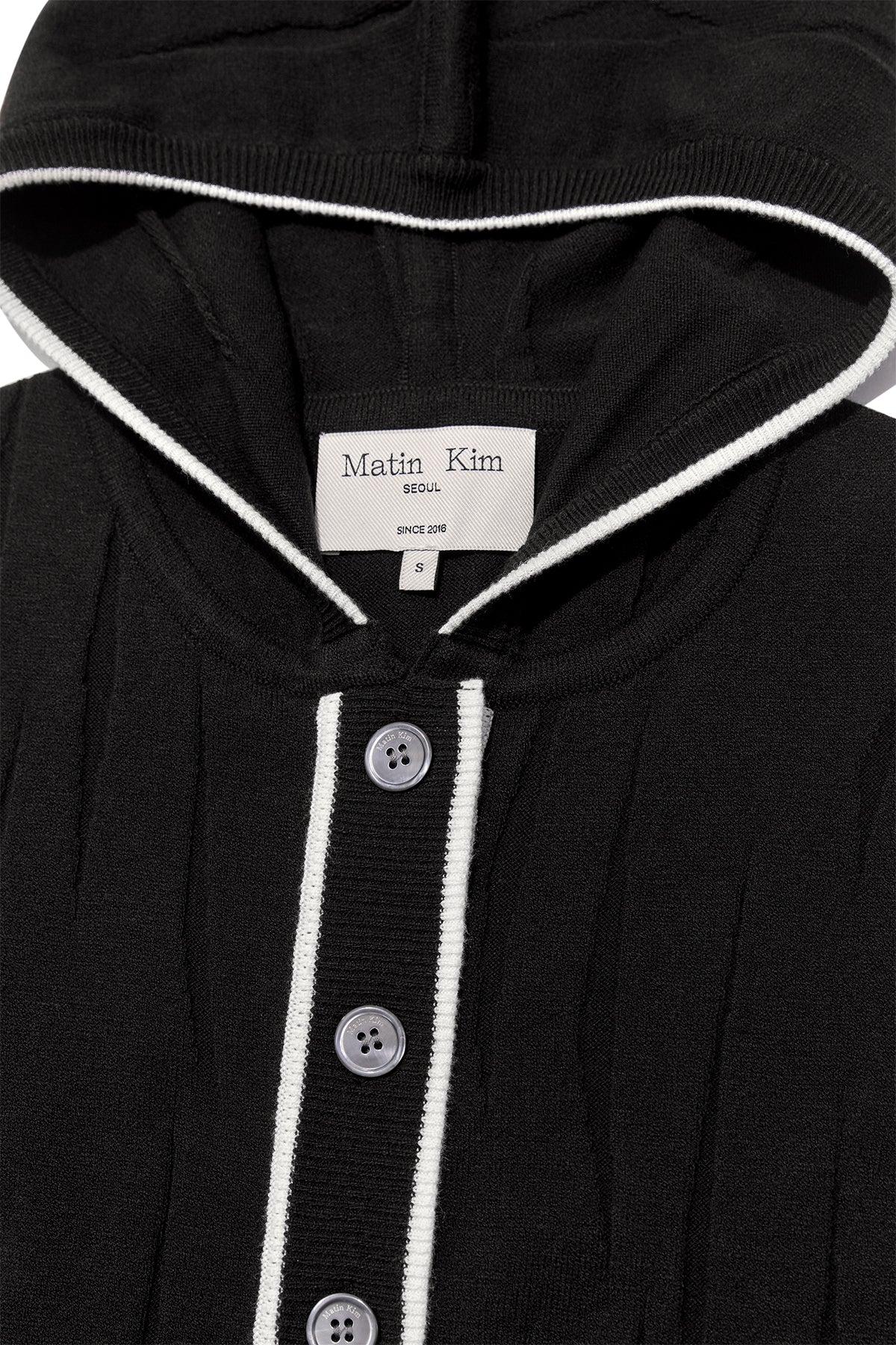 [matinkim] WRINKLE HOODY BUTTON KNIT VEST IN BLACK