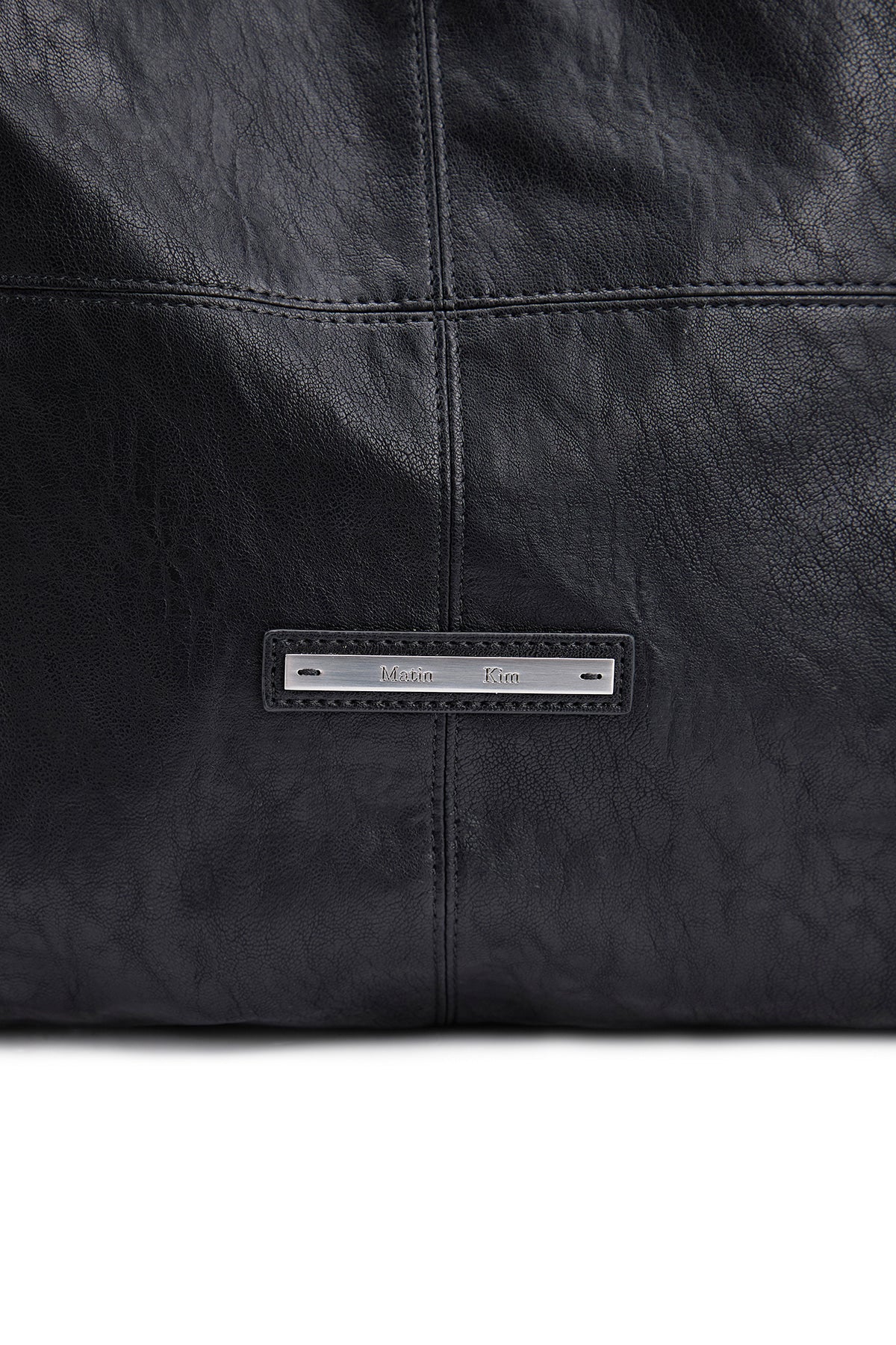 [matinkim] SIDE STRING LEATHER BIG SHOULDER BAG IN BLACK