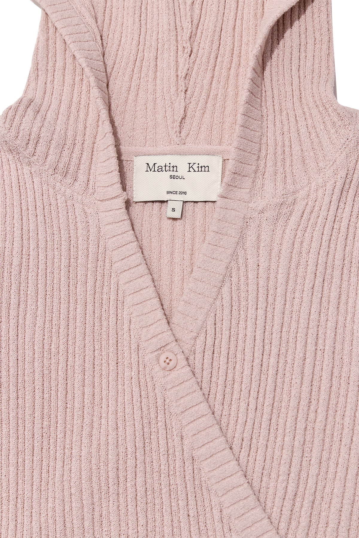 [matinkim] WRAP SLEEVELESS KNIT HOODY TOP IN LIGHT PINK