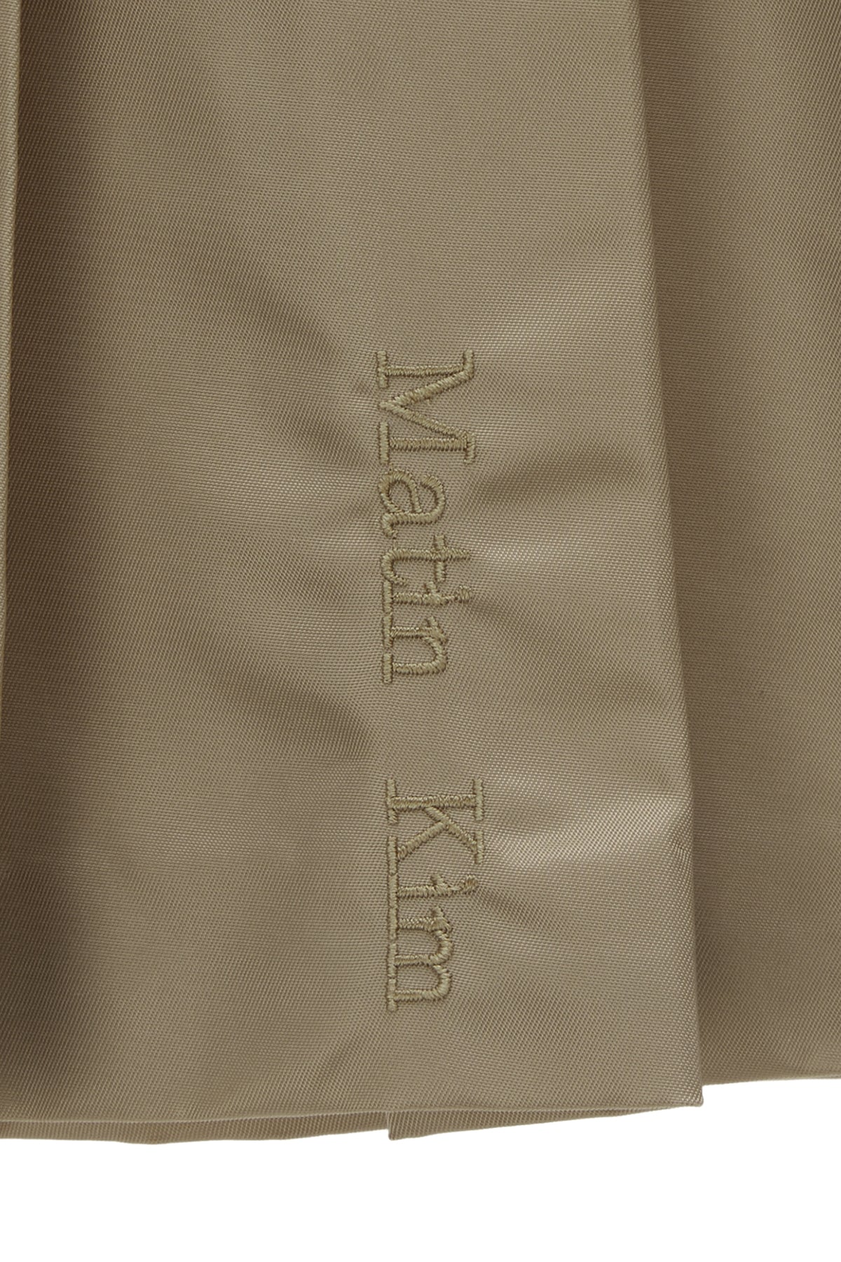 Matinkim Lowrise Pleats Mini Skirt IN Beige
