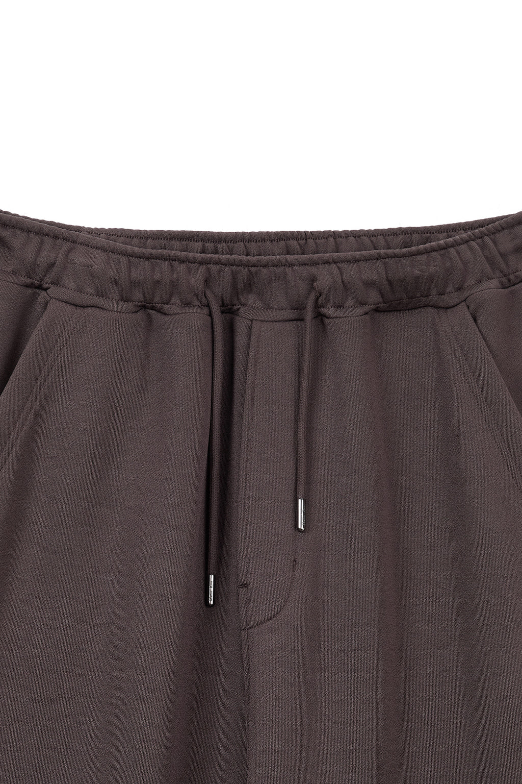 [matinkim] BACK POCKET GLITTER SWEATPANTS FOR MEN IN BROWN