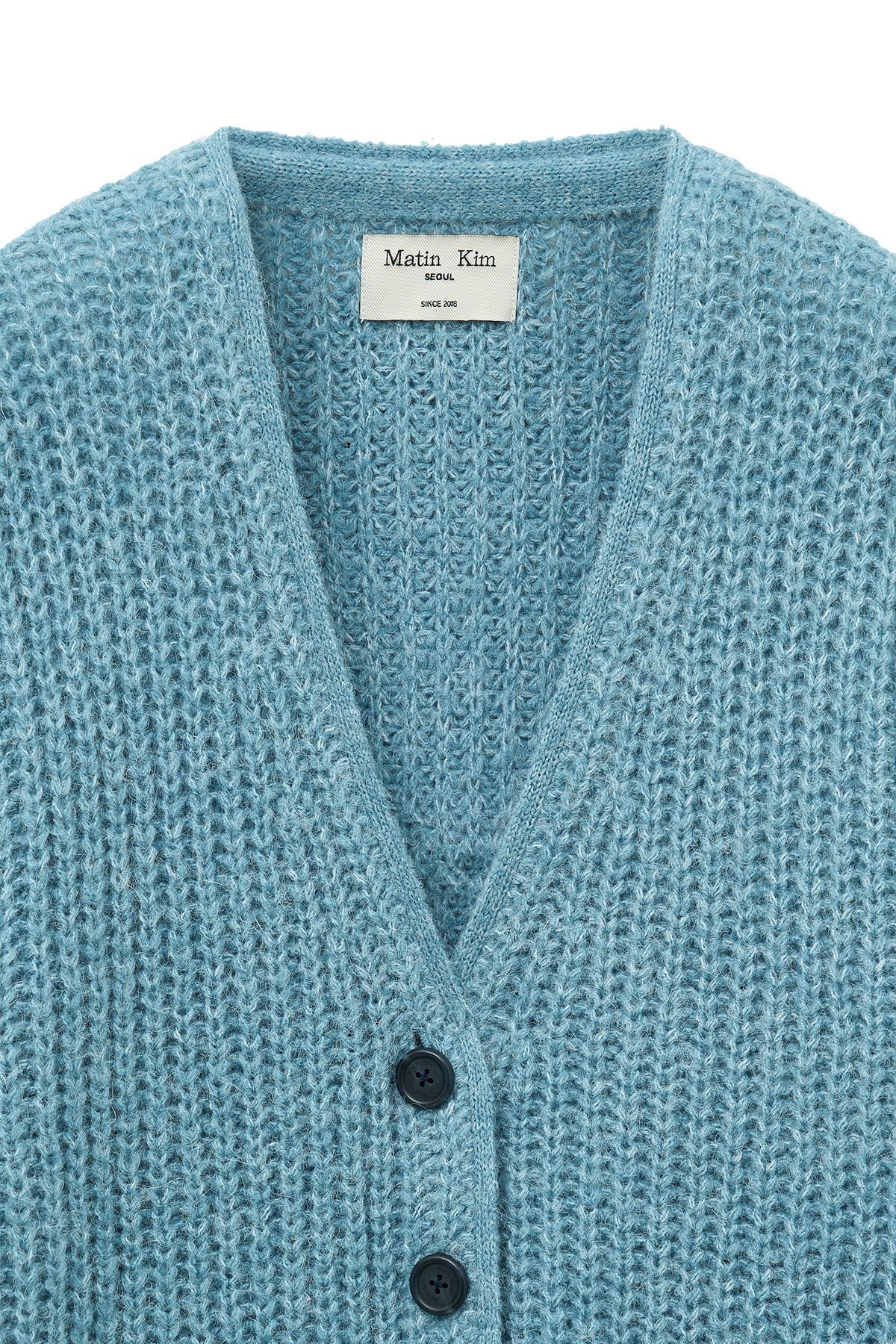 [matinkim] SIDE BUTTON POINT OVERFIT CARDIGAN IN LIGHT BLUE