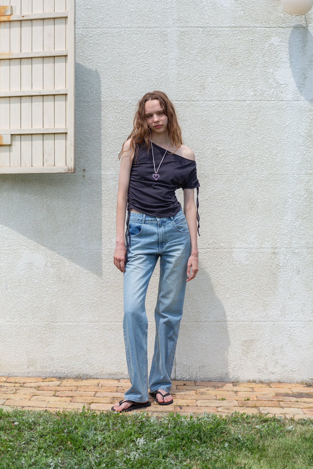 [matinkim] POCKET WASHED POINT DENIM PANTS IN LIGHT BLUE