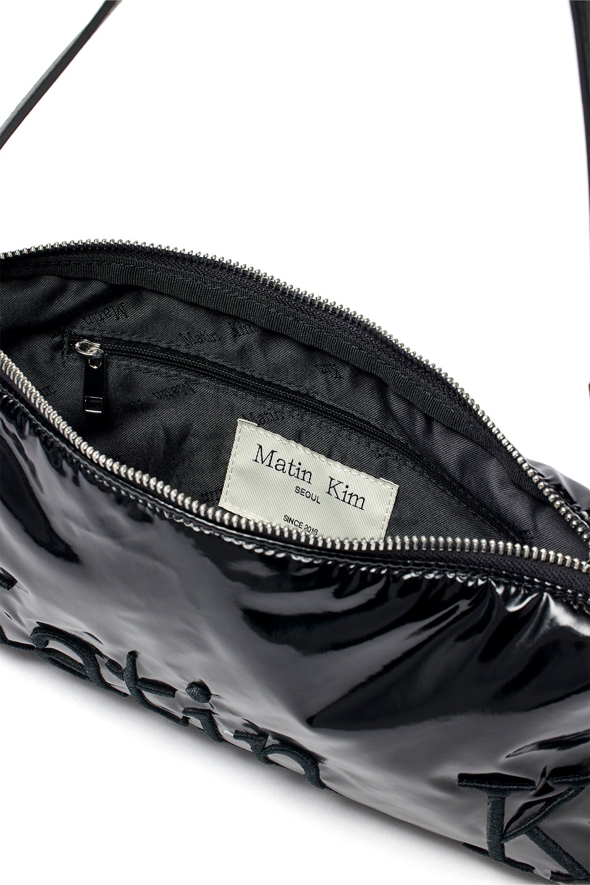 [matinkim] GLOSSY LOGO STITCH MINI SHOULDER BAG IN BLACK