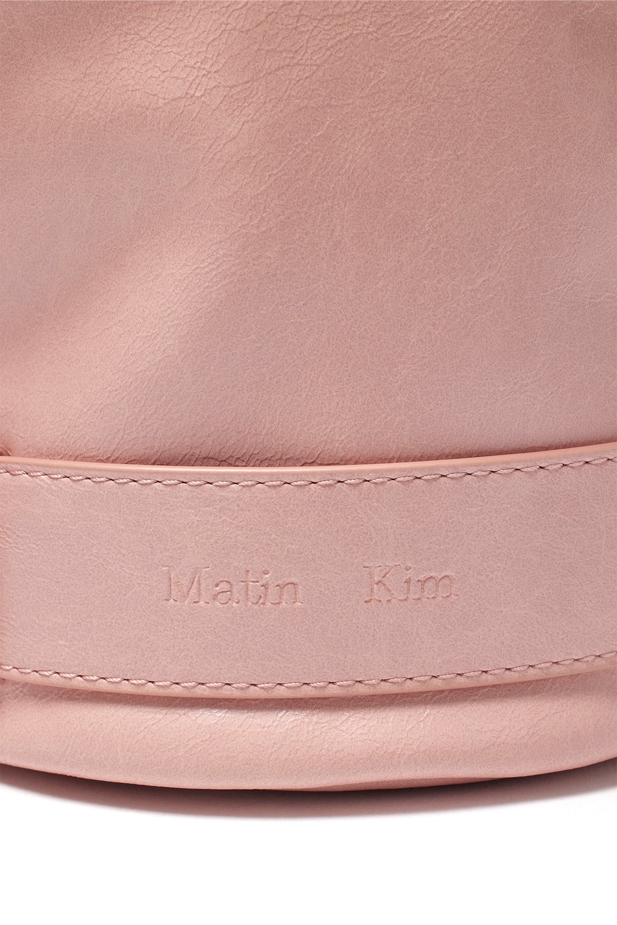 [matinkim] BELTED MINI BUCKET BAG IN PINK