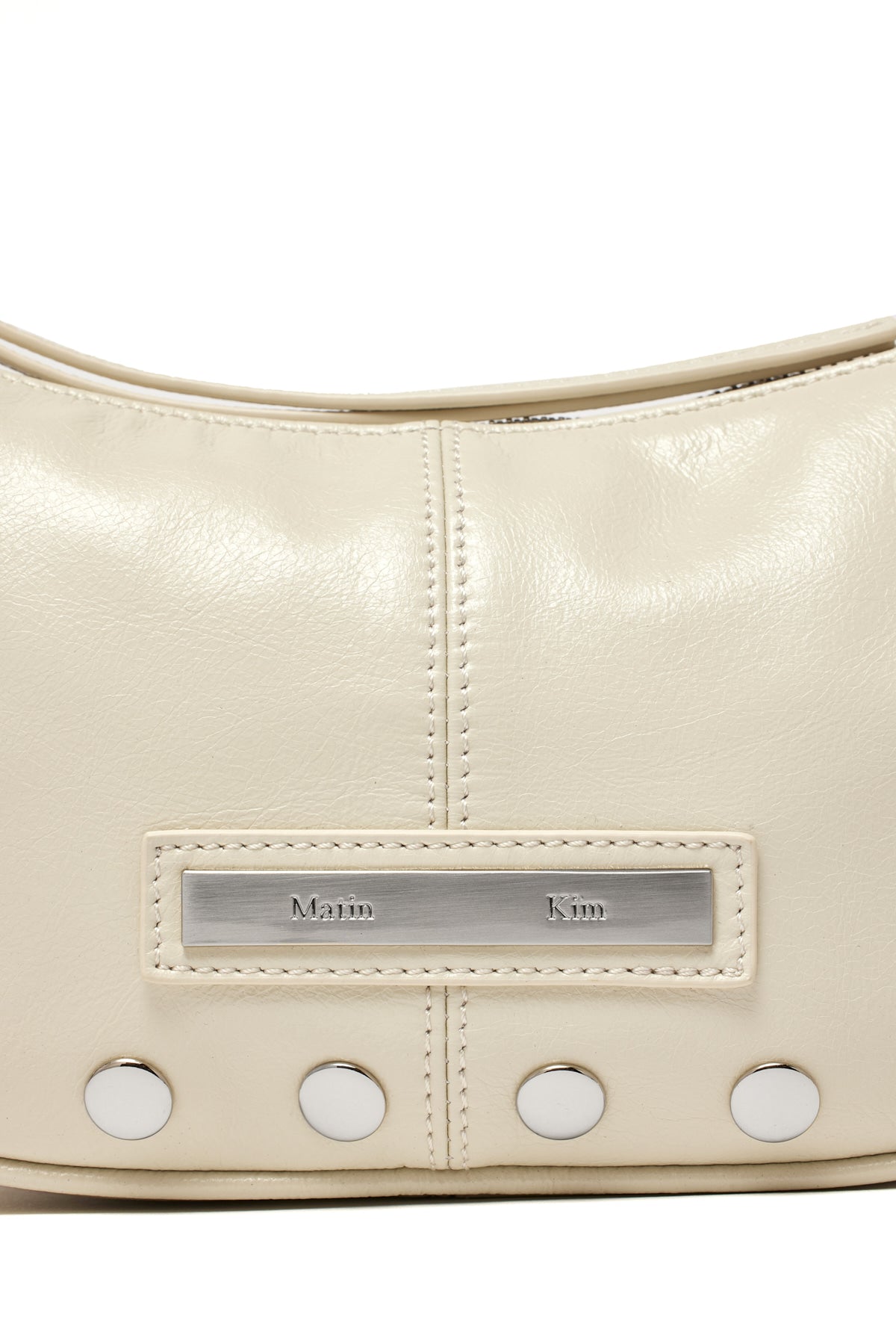 [matinkim] STUD LEATHER SHOULDER BAG IN IVORY