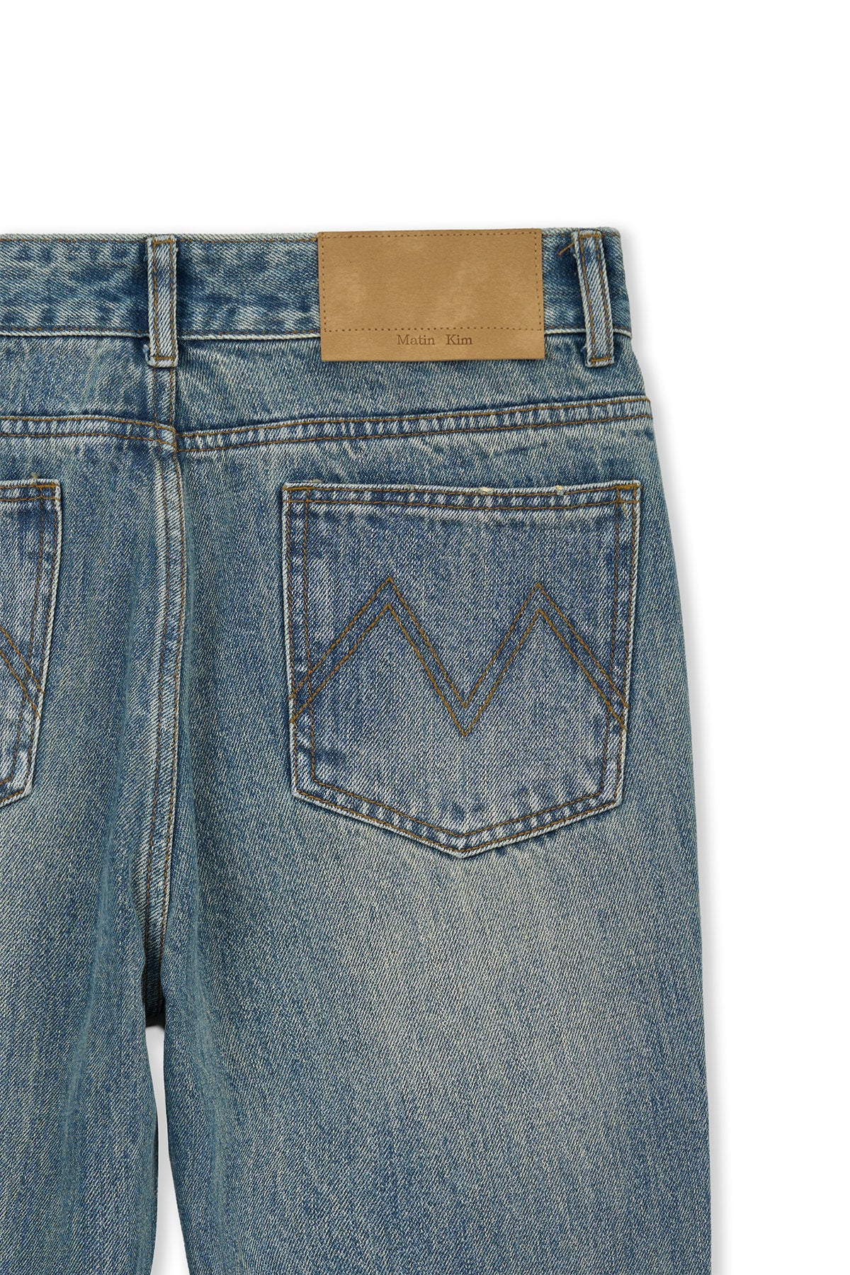 [matinkim] WASHED POINT BOOTS CUT DENIM PANTS IN BLUE