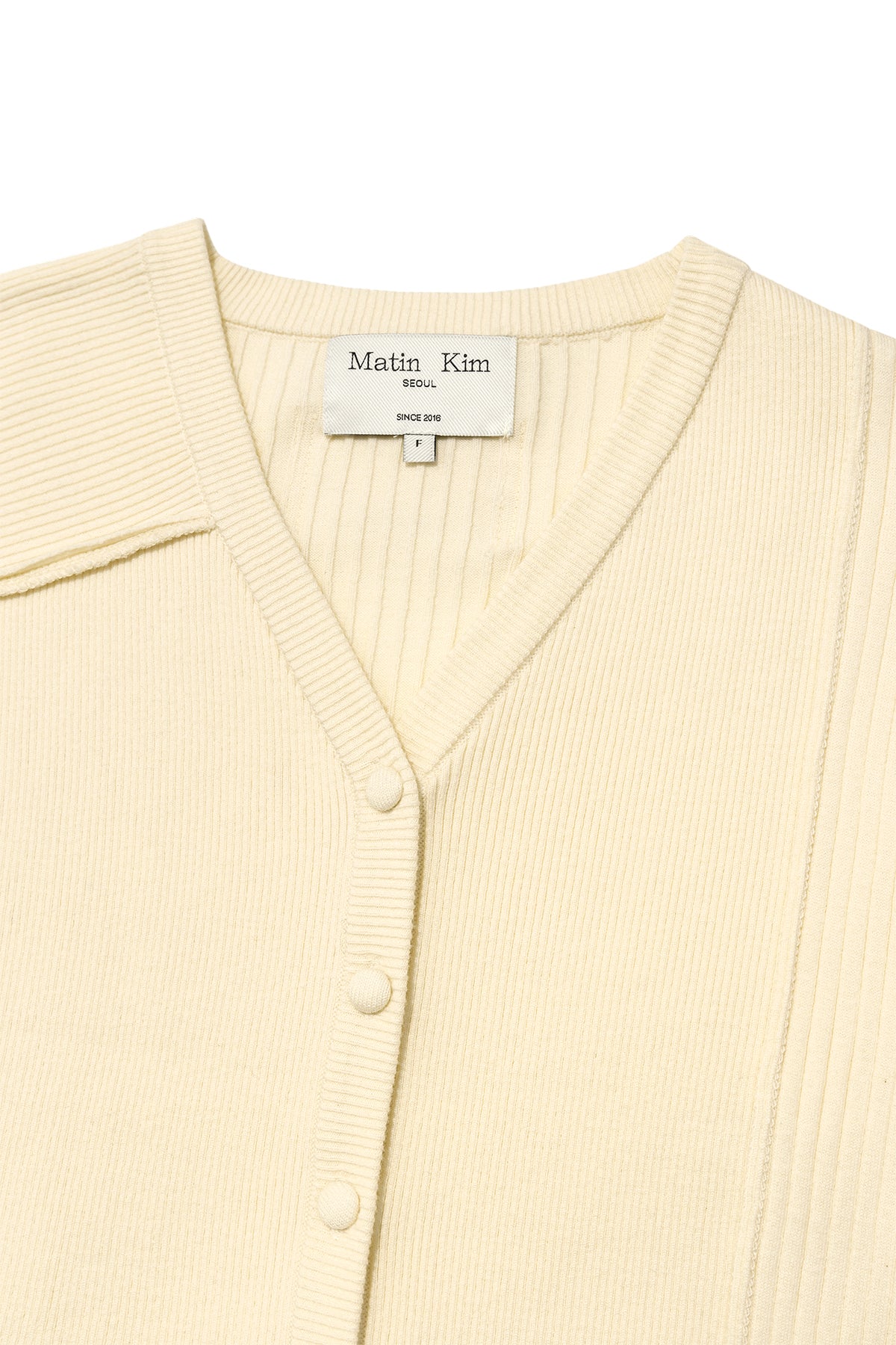 [matinkim] UNBALANCE CUT LINE BUTTON CARDIGAN IN BUTTER