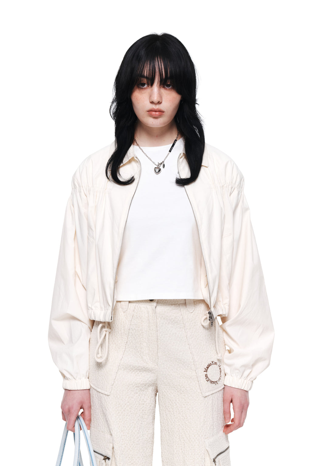 [matinkim] STRING DETAILED ZIP JUMPER IN IVORY