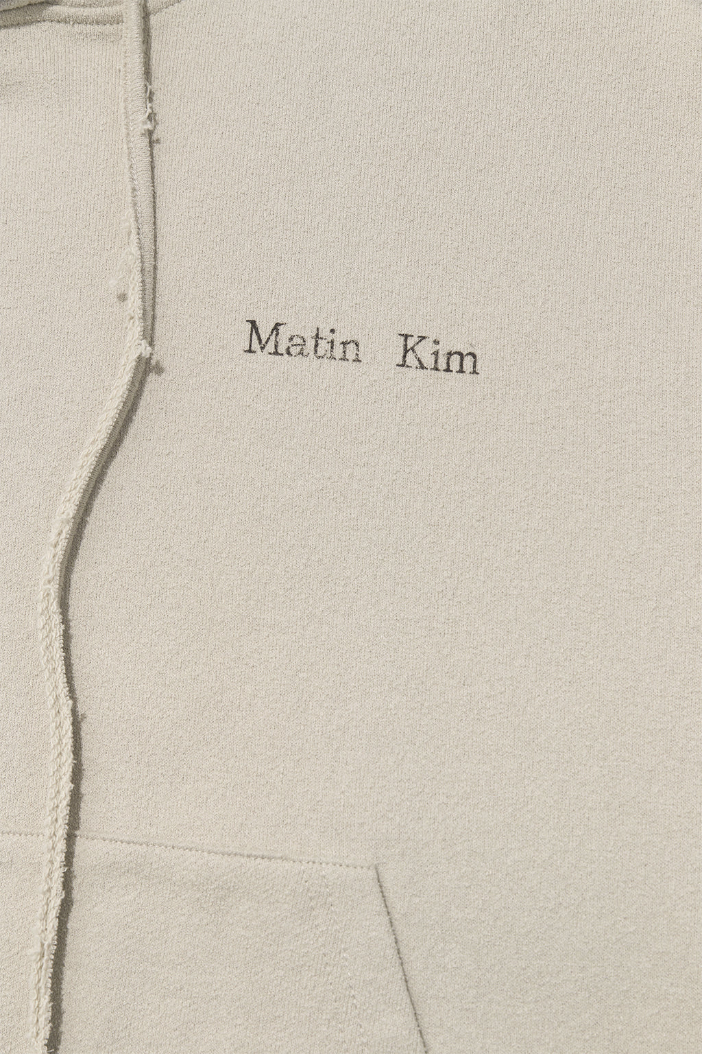 [matinkim] RIB CUT DETAIL LOGO HOODY IN BEIGE