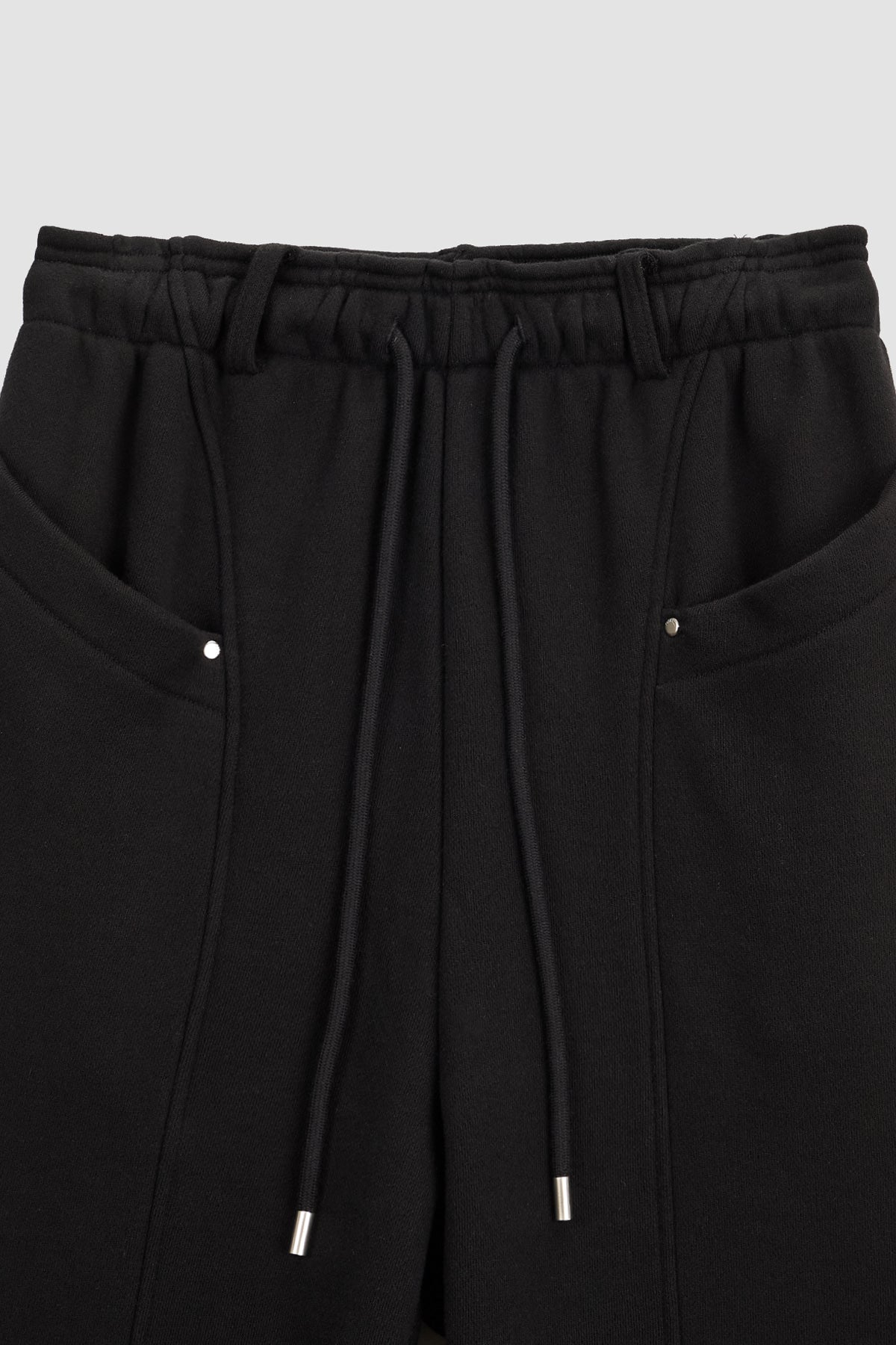 Matinkim Pocket Rivet Loose Fit Sweat Pants IN Black
