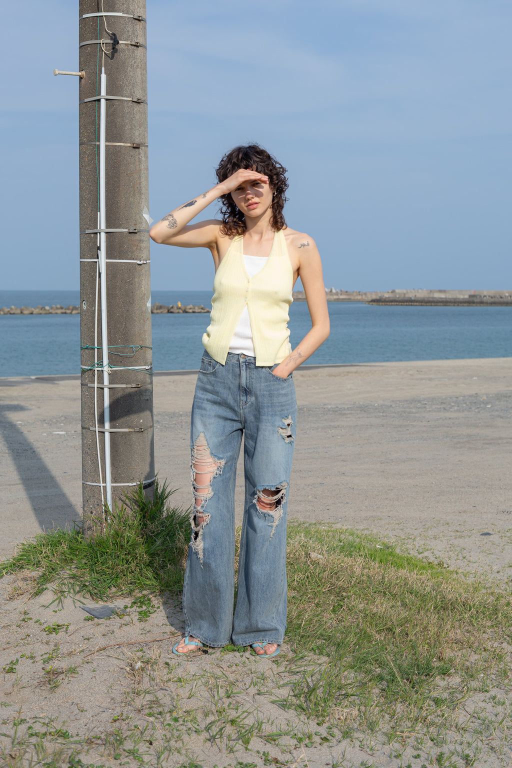 [matinkim] LAYERED BUTTON HALTER NECK TOP IN LIGHT YELLOW