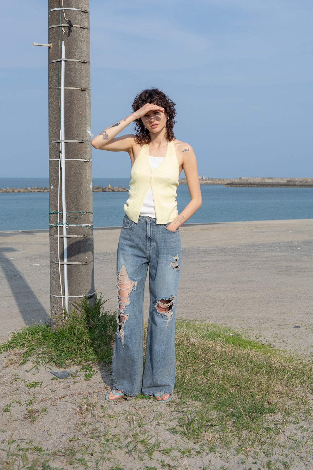 [matinkim] LAYERED BUTTON HALTER NECK TOP IN LIGHT YELLOW