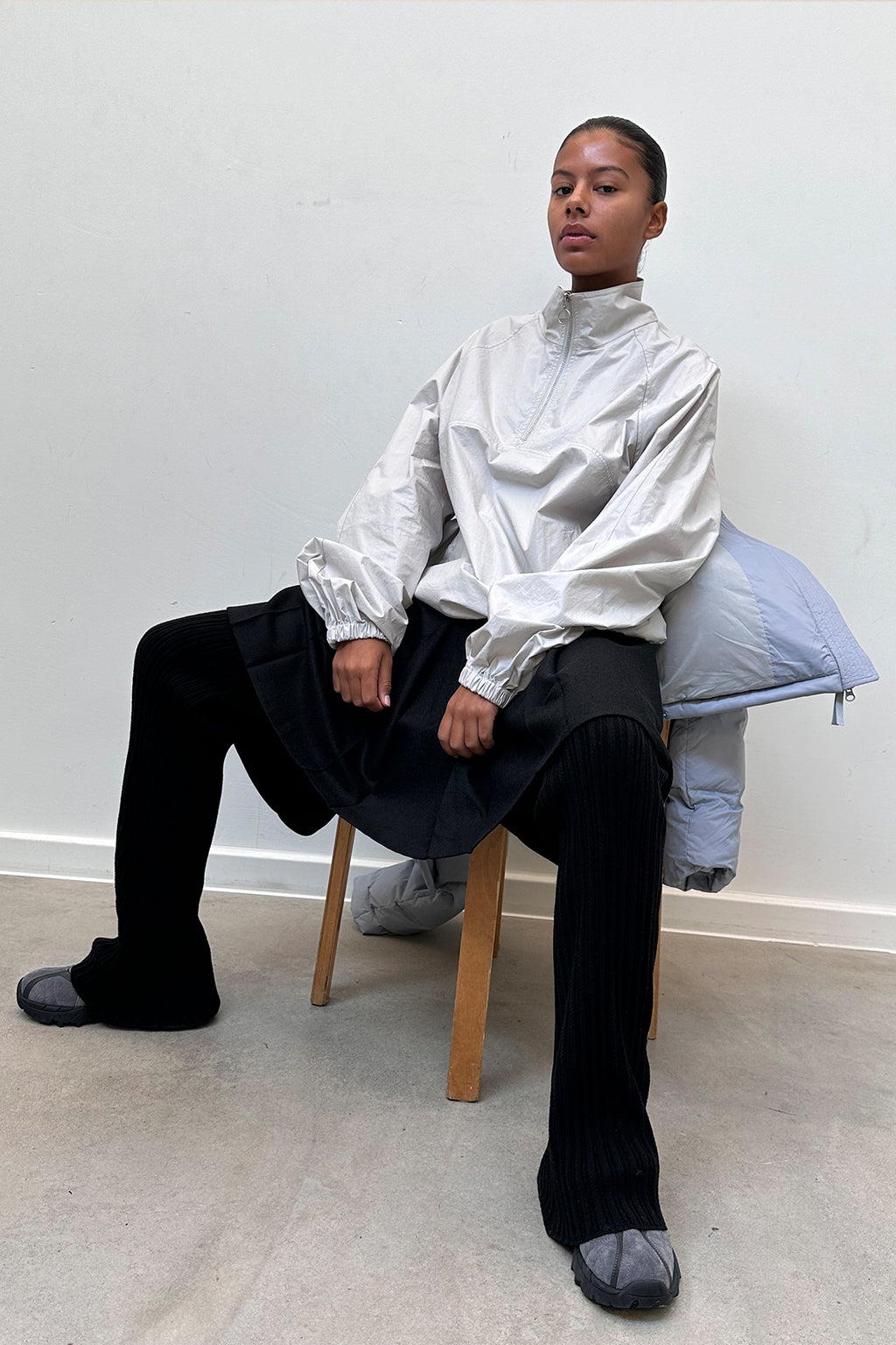 [matinkim] LAYERED KNIT BOOTS CUT PANTS IN BLACK