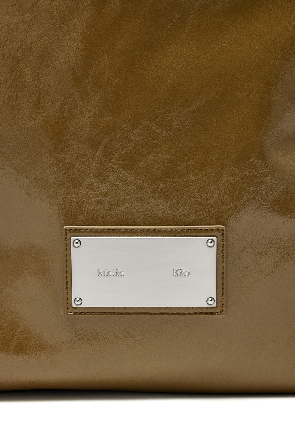 [matinkim] EMBOSSED LOGO LEATHER SHOULDER BAG IN KHAKI