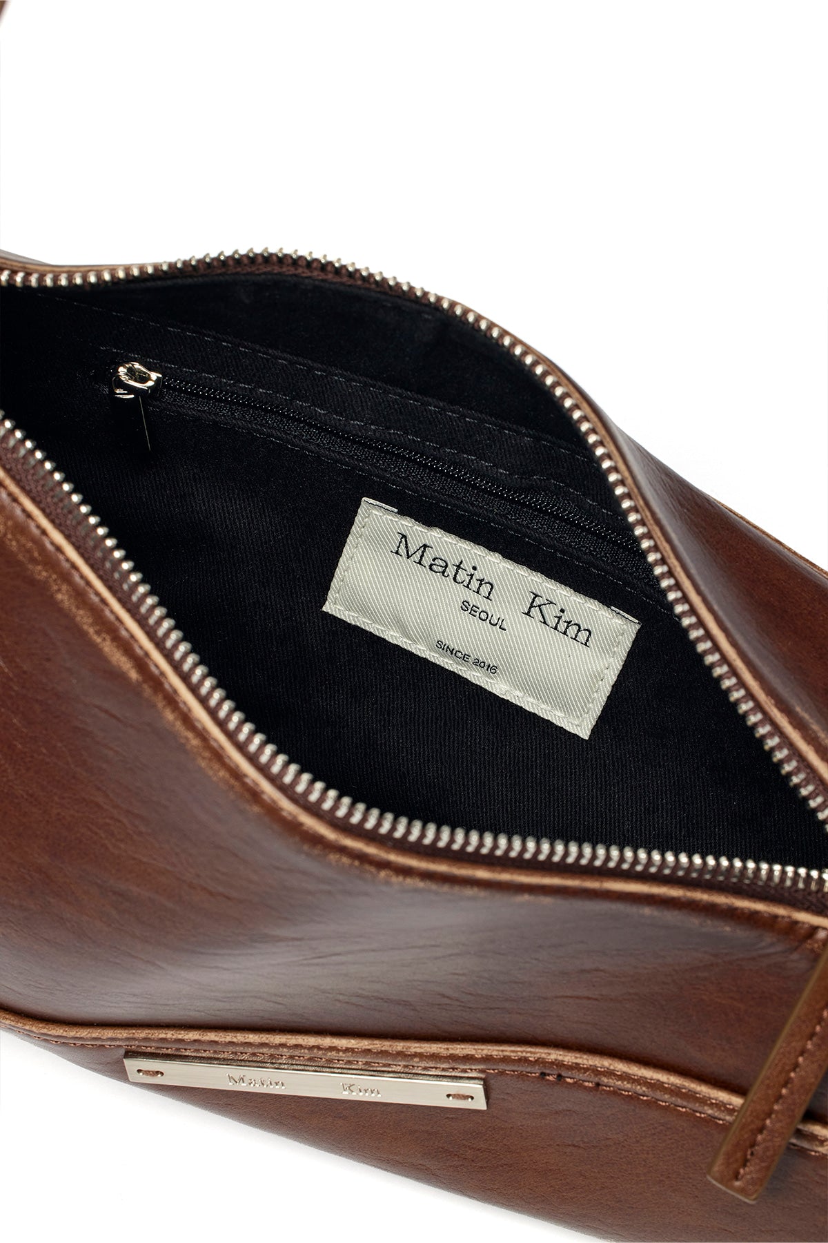 [matinkim] DIRTY WASHED DIAGONAL BAG IN BROWN