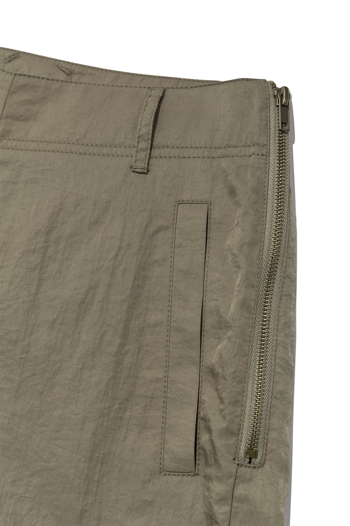 [matinkim] ZIPPER DETAIL NYLON PANTS IN KHAKI