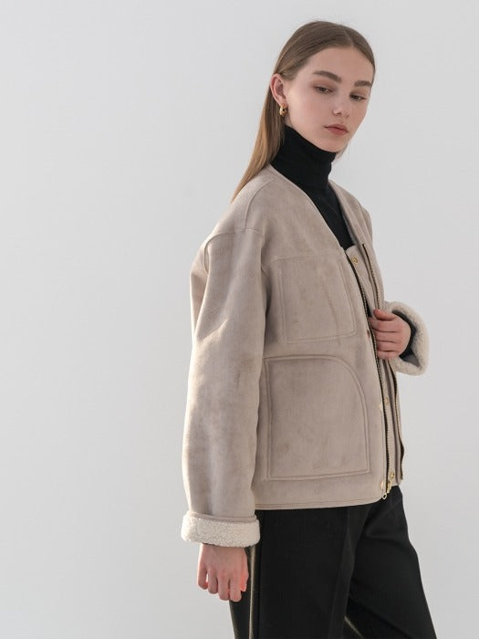 [TILLIDIE] Reversible eco-shearing collarless jacket in ivory_