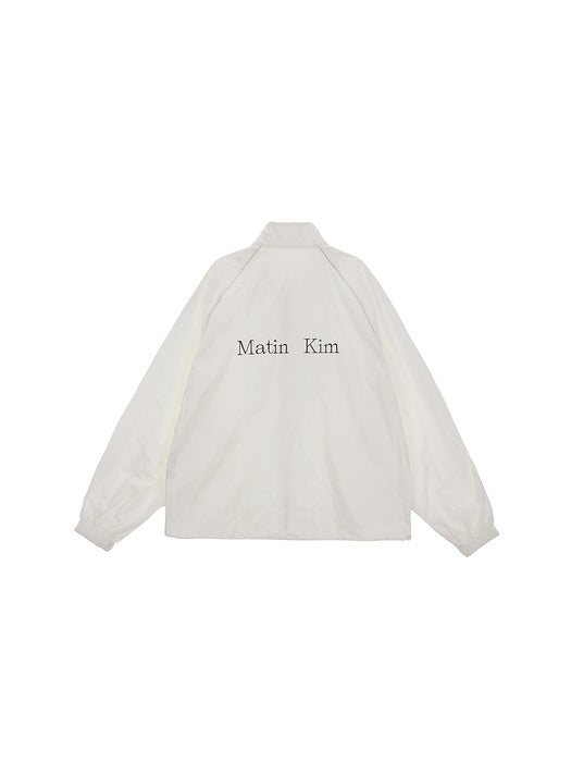MATIN KIM LOGO COATING JUMPER IN IVORY