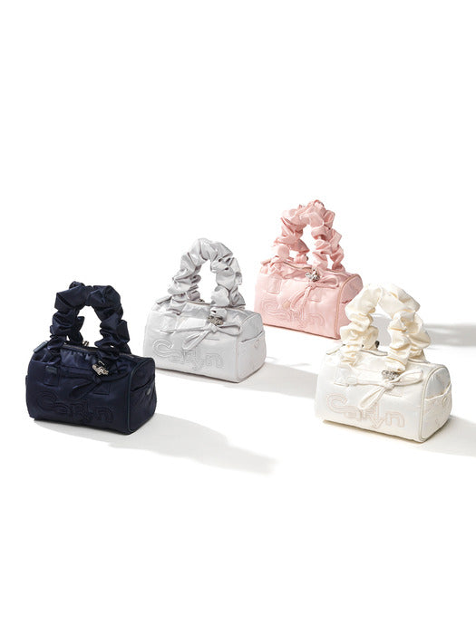 Carlyn Tia Mini