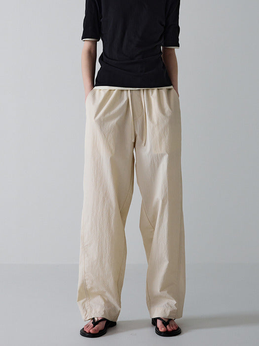 Facade Pattern Tapered Banding Pants cream