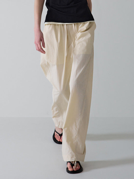 Facade Pattern Tapered Banding Pants cream