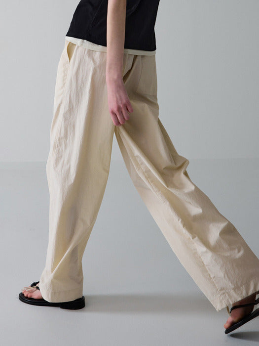 Facade Pattern Tapered Banding Pants cream