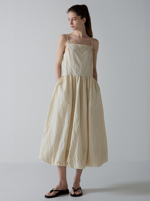 [facade pattern] Volume Sleeveless Dress - Cream