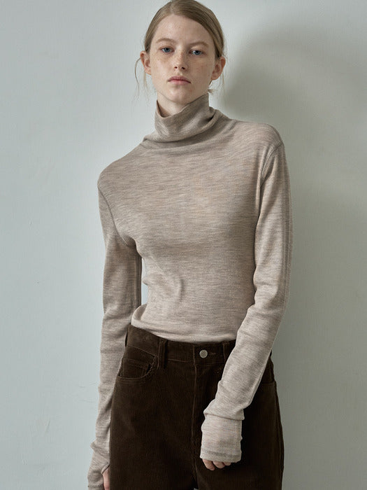Facade Pattern Breeze Wool Roll Neck Top