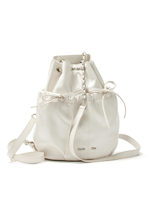 DRAW STRING RIBBON BACK PACK IN IVORY