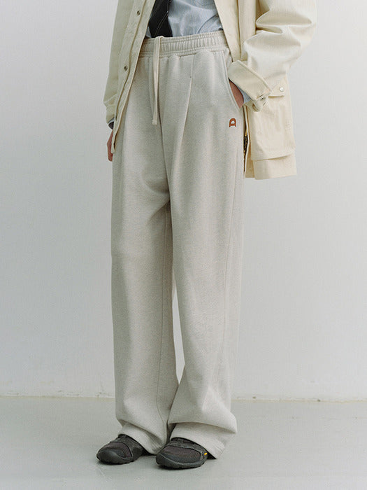 [dunst] UNISEX LEATHER LOGO WIDE SWEAT PANTS OATMEAL MELANGE_UDPA6A102I1