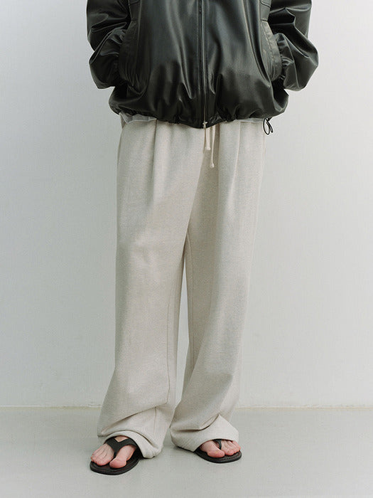 [dunst] UNISEX LEATHER LOGO WIDE SWEAT PANTS OATMEAL MELANGE_UDPA6A102I1